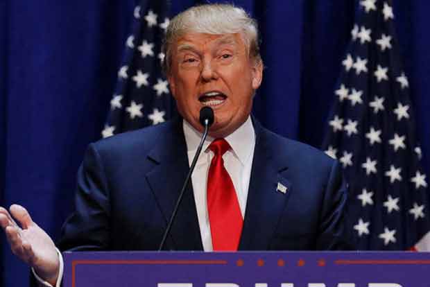 Trump says hell decide on Paris climate deal next week