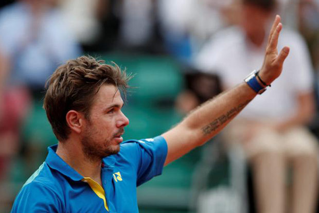 Upbeat Wawrinka wins ugly to get French Open campaign rolling