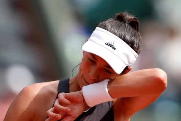 Holder Muguruza stamps some star-appeal on Paris