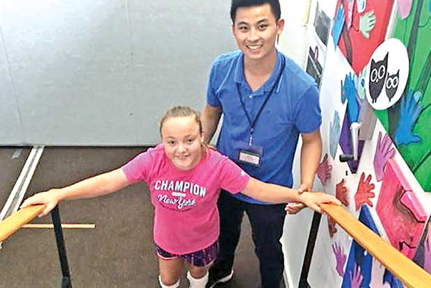 11-year-old girl with cerebral palsy climbs Great Wall of China 11-year-old girl with cerebral palsy climbs Great Wall of China