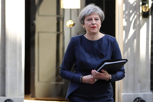 British PM May finds it lonely at the top
