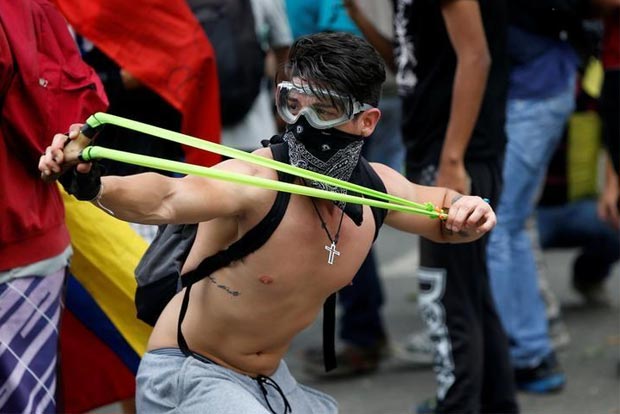 Venezuelans opposition calls new strike, violence flares