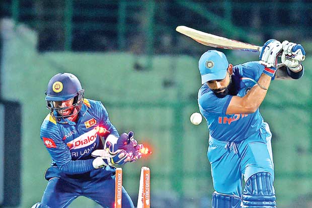 Kohli doffs his hat to off-spinner Dananjaya