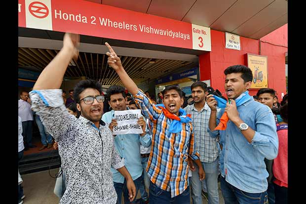 NSUI activists stop metro train against proposed fare hike