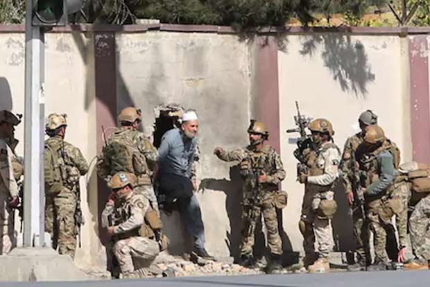 Gunmen disguised as police officers storm Kabul TV station in deadly attack on freedom of media