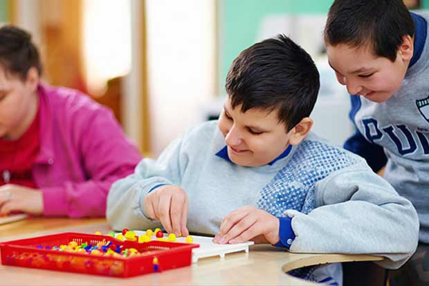 How to help autistic children socialise