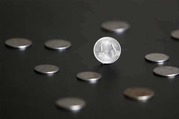 Rupee crumbles to over 1-month low, tanks 26 paise to 65.42