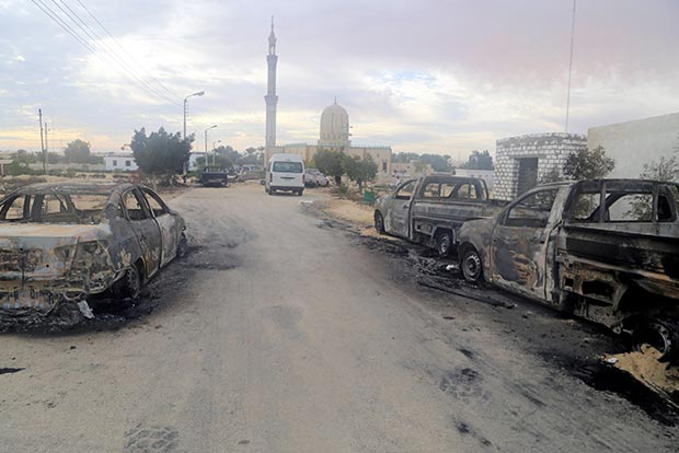 Egypt says attackers had Islamic State flag as mosque death toll rises
