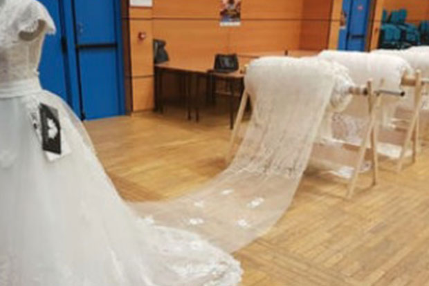 Wedding dress train that is 27 times Eiffel Tower’s size