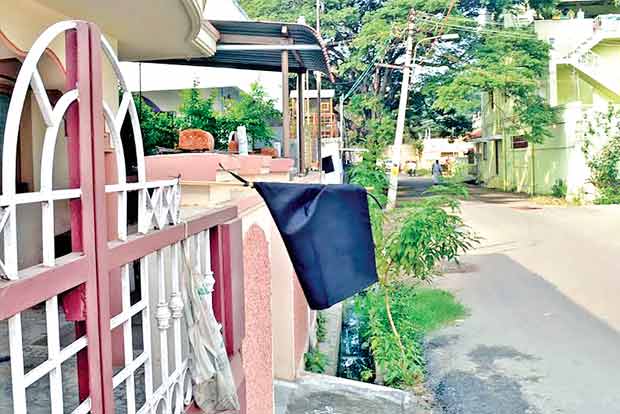 Villagers hoist black flags for basic needs