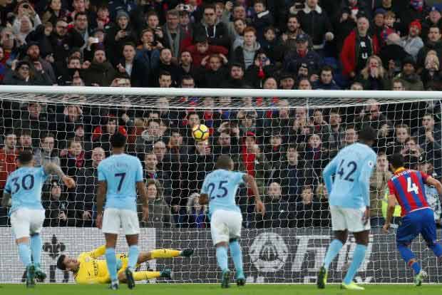 Edersons penalty save preserves Citys unbeaten record