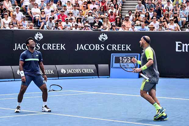 Paes and Raja save match point to make pre-quarters