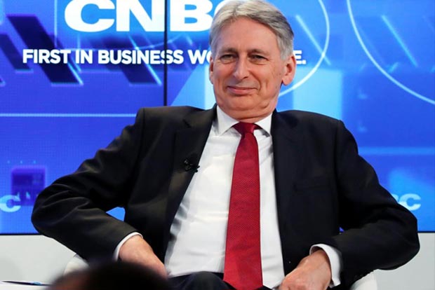 Britain will not reverse Brexit, Hammond tells CEOs in Davos